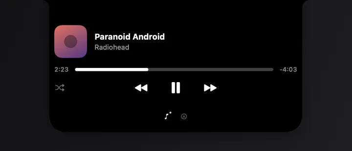 Notch aberto mostrando "Paranoid Android" tocando, com controles de reprodução e barra de progresso
